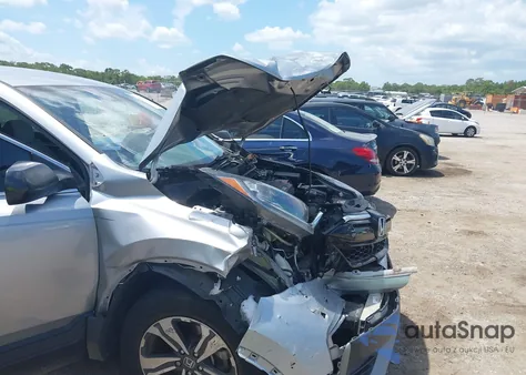 2021 Honda Cr-V 2Wd Lx from USA, damaged, VIN 7FARW1H28ME006836